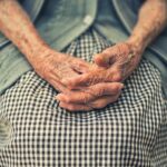 person's hand in shallow focus