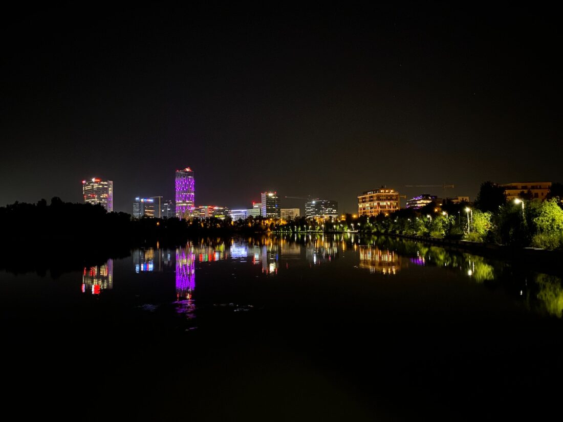 city skyline during night time