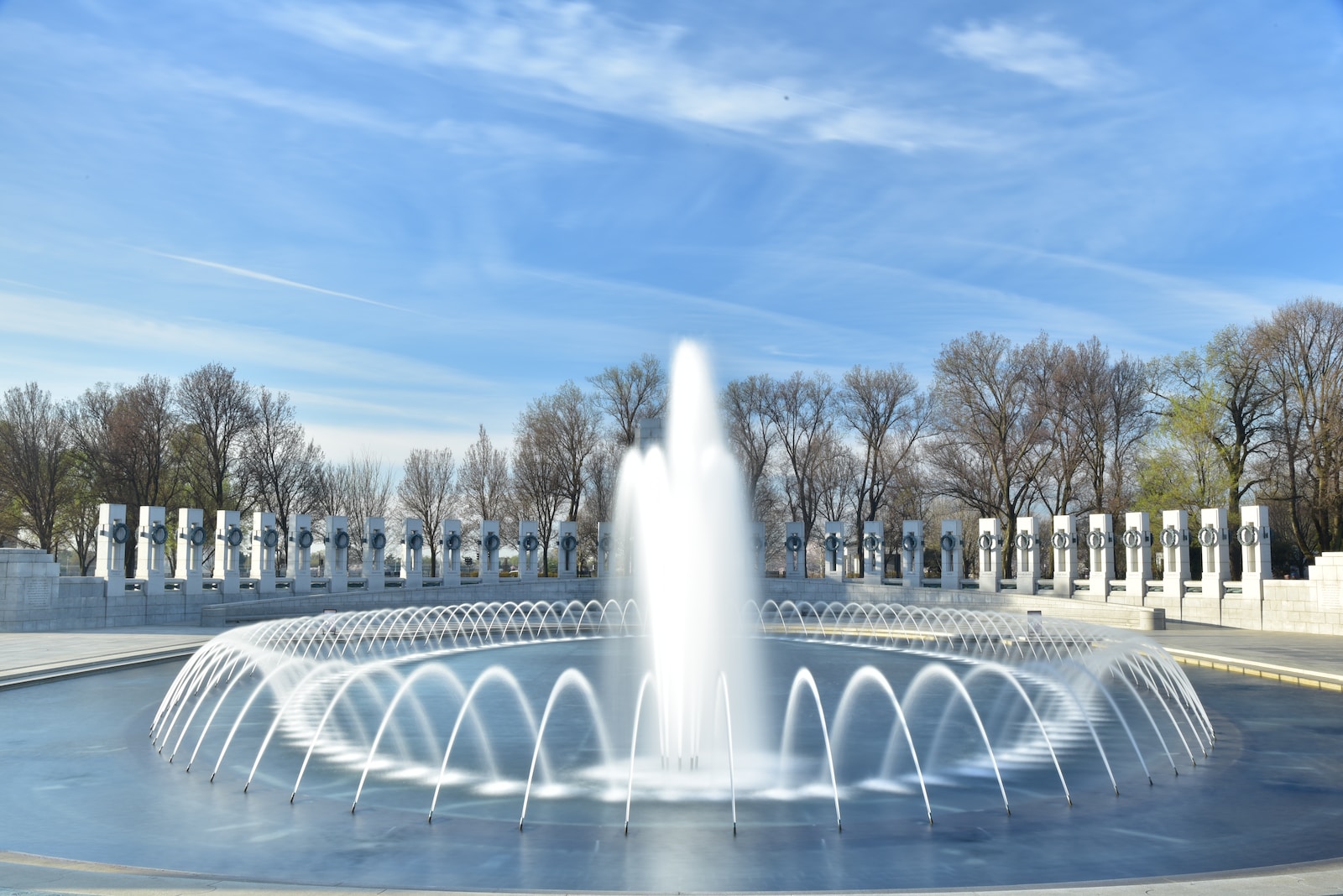 water fountain under blue sky during daytime