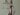 woman in gold dress holding sword figurine