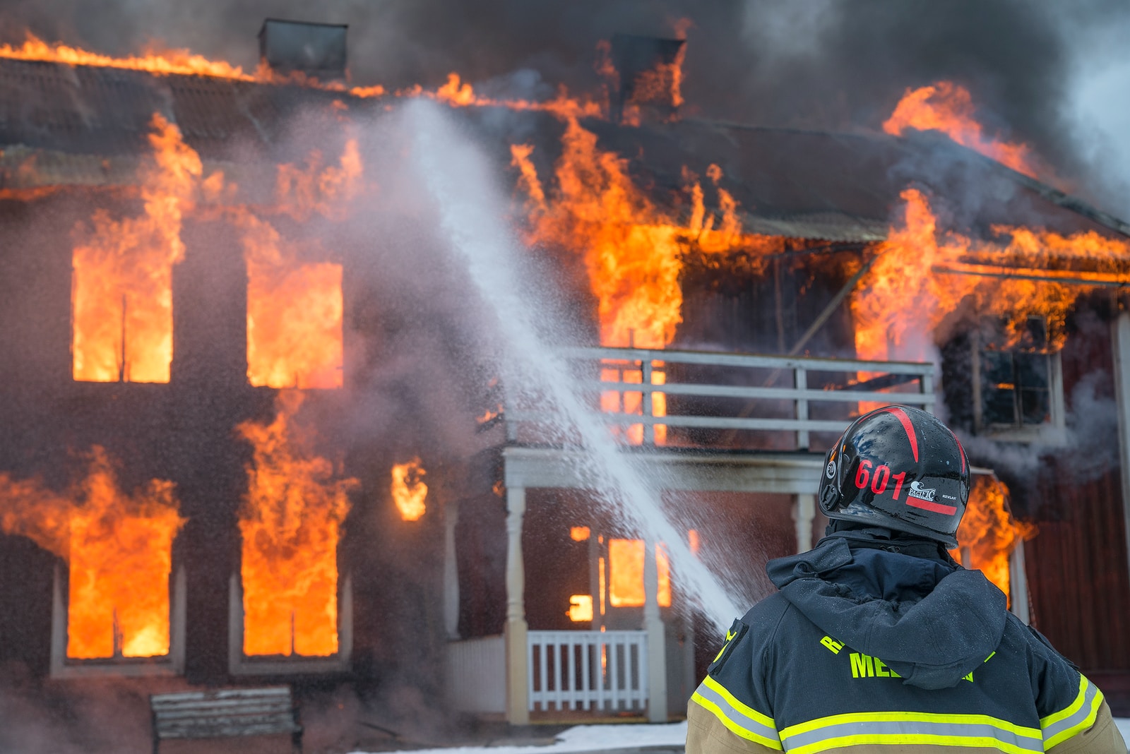 fireman watering fire