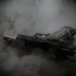 gray and black space ship on gray clouds