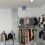Percheziții într-un dosar de evaziune fiscală cu haine de lux FOTO: Poliția Română