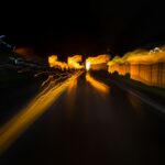 white building near body of water during night time