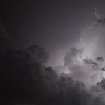 white clouds with moon in the sky